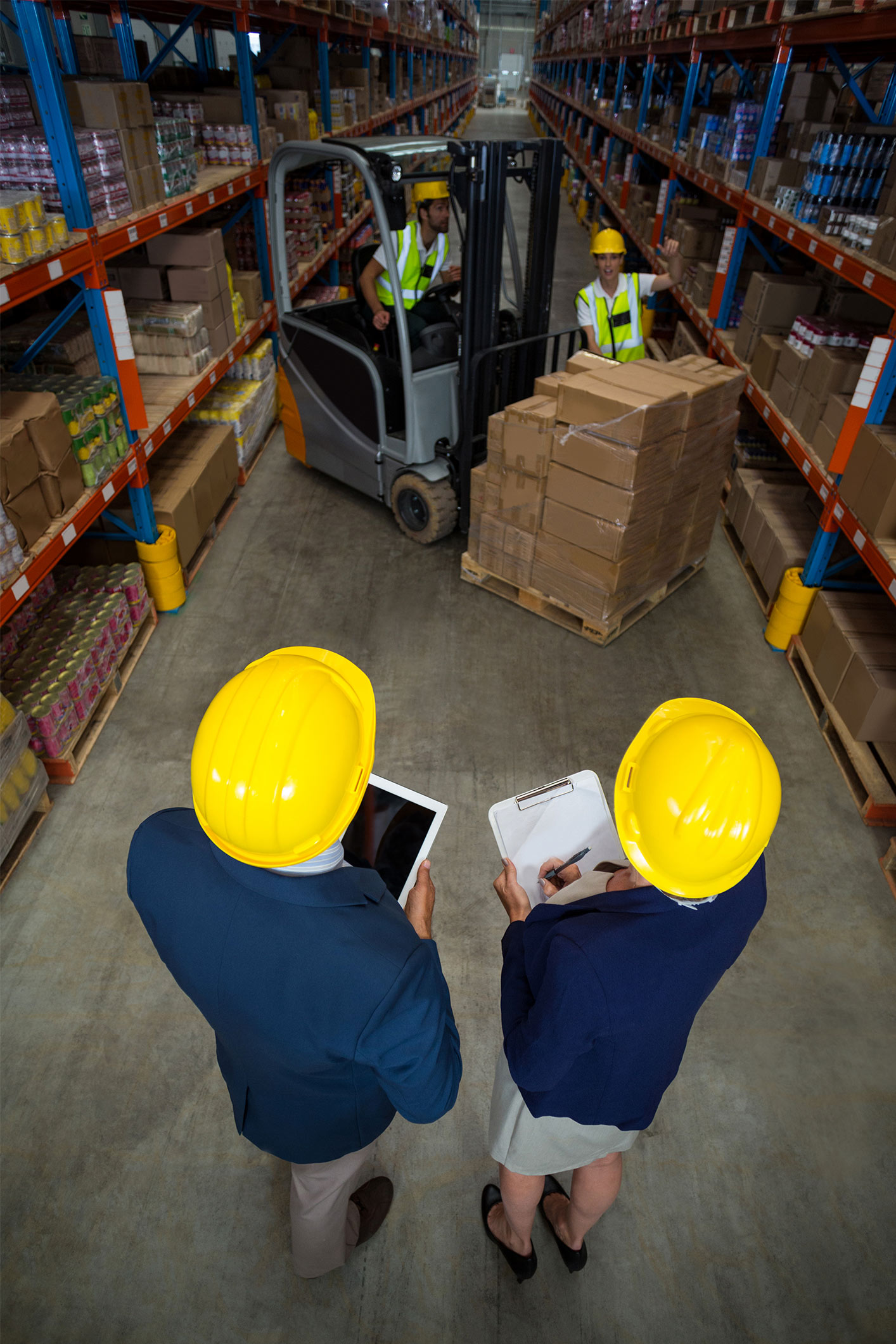 high-angle-view-manager-wearing-hard-hat-looking-workers